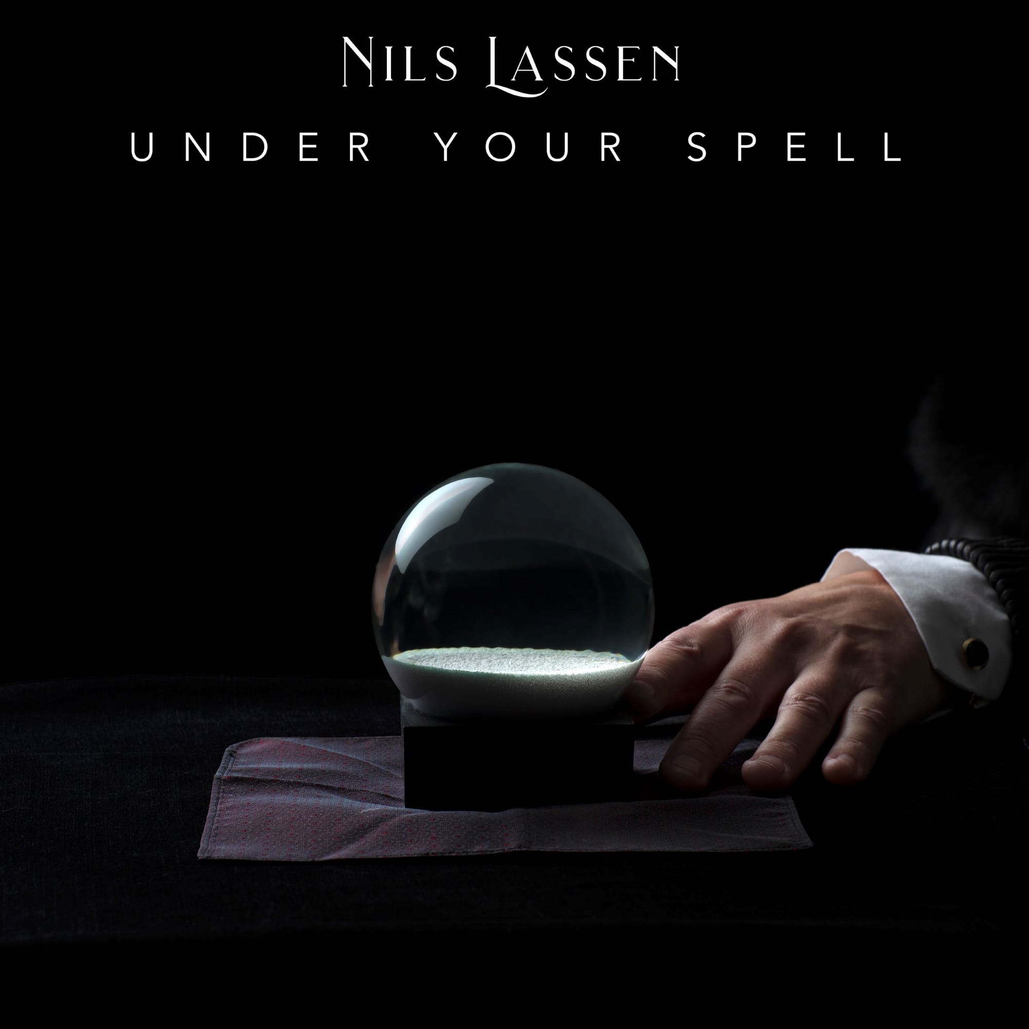 Nils Lassen released "Under Your Spell" - first single from upcoming album "Rain Steam Speed"